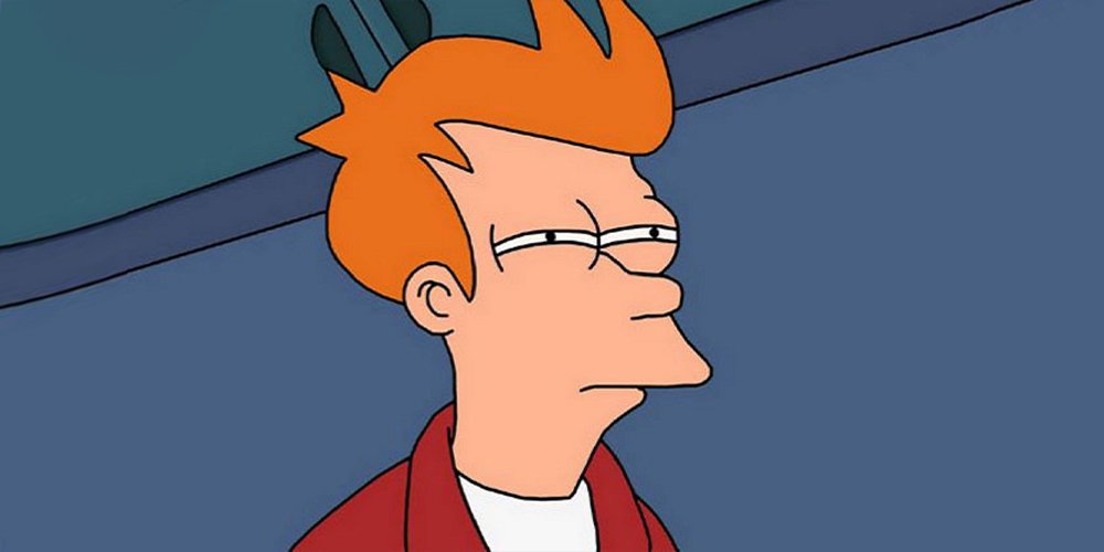 A snapshot of the character Fry from Futurama. He is looking annoyed and squinting his eyes.